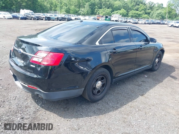 2014 Ford Police Interceptor with VIN 1FAHP2MK0EG170496, listed as a IAAI auction lot 42693683 with 147,921 mi miles and . Bid and sale history available at DreamBid. Image 4.