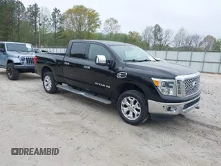 2016 Nissan Titan XD Platinum Reserve with VIN 1N6BA1F28GN515522, listed as a IAAI auction lot 41946785 with 77,380 mi miles. Bid and sale history available at carsss.com. Image 1.