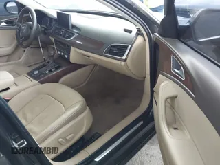 2014 Audi A6 Premium Plus z VIN WAUGFAFC7EN025053, wystawiony jako IAAI lot #42131033 z przebiegiem 154 552 mil mil oraz . Historia ofert i sprzedaży dostępna na DreamBid. Obrazek 5.