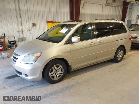 2006 Honda Odyssey EX-L with VIN 5FNRL387X6B449343, listed as a IAAI auction lot 42162759 with 242,590 mi miles. Bid and sale history available at carsss.com. Image 2.