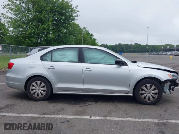 2014 Volkswagen Jetta S z VIN 3VW2K7AJ7EM217758, wystawiony jako IAAI lot #42461868 z przebiegiem 141 962 mil mil oraz . Historia ofert i sprzedaży dostępna na DreamBid. Obrazek 13.