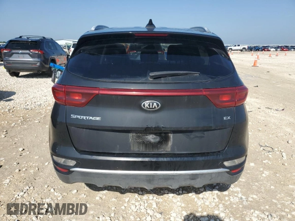 2020 Kia Sportage EX z VIN KNDPN3AC3L7702030, wystawiony jako Copart lot #54978895 z przebiegiem 53 099 mil mil oraz Czysty tytuł • Clean title. Historia ofert i sprzedaży dostępna na DreamBid. Obrazek 6.
