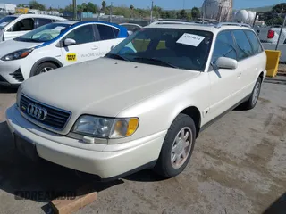 1996 Audi A6 z VIN WAUJA84A1TN104505, wystawiony jako IAAI lot #42039674 z przebiegiem 171 088 mil mil oraz . Historia ofert i sprzedaży dostępna na DreamBid. Obrazek 2.