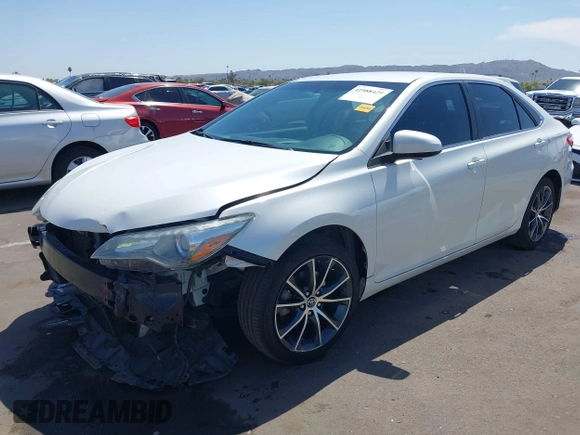 2015 Toyota Camry XLE with VIN 4T1BF1FK4FU477825, listed as a IAAI auction lot 41988429 with 156,886 mi miles and . Bid and sale history available at DreamBid. Image 2.