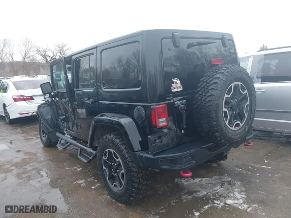 2015 Jeep Wrangler Unlimited Rubicon Hard Rock with VIN 1C4HJWFG9FL569962, listed as a IAAI auction lot 41557801 with 78,597 mi miles. Bid and sale history available at carsss.com. Image 3.