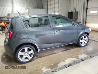 2016 Chevrolet Sonic LTZ z VIN 1G1JE6SB3G4108552, wystawiony jako Copart lot #57843505 z przebiegiem 101 897 mil mil oraz Szkoda całkowita • Salvage title. Historia ofert i sprzedaży dostępna na DreamBid. Obrazek 3.