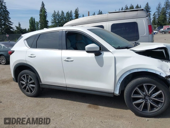 2018 Mazda CX-5 Grand Touring with VIN JM3KFBDM1J0309260, listed as a IAAI auction lot 42247237 with Not Provided miles and . Bid and sale history available at DreamBid. Image 13.
