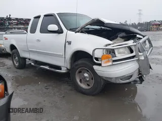 1999 Ford F-150 XL with VIN 1FTRX18L6XNB48352, listed as a IAAI auction lot 41717057 with 171,654 mi miles. Bid and sale history available at carsss.com. Image 1.