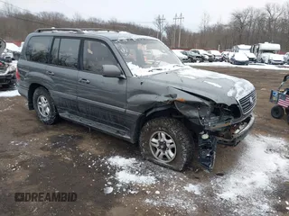 2000 Lexus LX with VIN JT6HT00W9Y0096647, listed as a IAAI auction lot 41376347 with 231,916 mi miles. Bid and sale history available at carsss.com. Image 1.