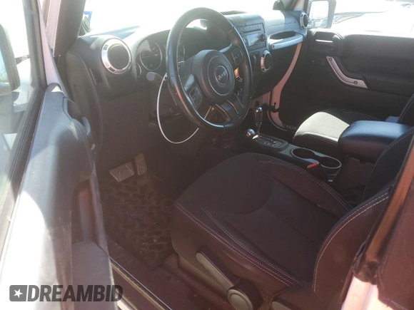 2014 Jeep Wrangler Sahara with VIN 1C4AJWBGXEL214269, listed as a Copart auction lot 47678045 with 283,634 mi miles and Clean Title. Bid and sale history available at DreamBid. Image 8.