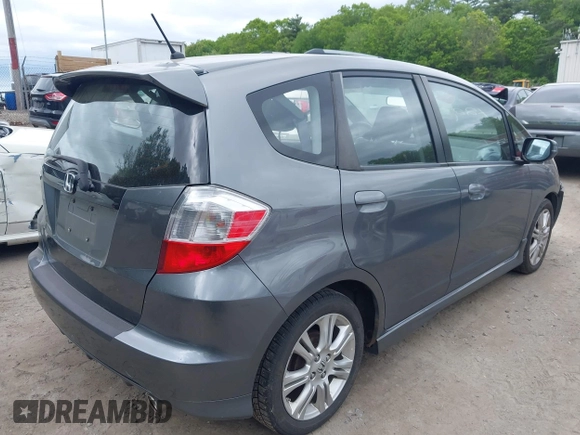 2011 Honda Fit Sport z VIN JHMGE8H53BS004872, wystawiony jako IAAI lot #42290323 z przebiegiem 145 685 mil mil oraz . Historia ofert i sprzedaży dostępna na DreamBid. Obrazek 4.