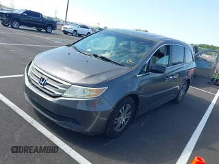 2011 Honda Odyssey EX-L with VIN 5FNRL5H62BB058765, listed as a IAAI auction lot 42017802 with 178,512 mi miles and . Bid and sale history available at carsss.com. Image 2.