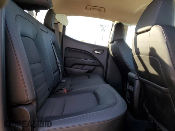 2021 GMC Canyon 4WD AT4 w/Cloth with VIN 1GTG6FEN9M1254293, listed as a Copart auction lot 87163874 with 33,645 mi miles and Salvage Title. Bid and sale history available at carsss.com. Image 10.