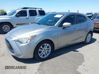 2016 Scion iA z VIN 3MYDLBZV1GY132561, wystawiony jako IAAI lot #42425947 z przebiegiem 94 882 mil mil oraz . Historia ofert i sprzedaży dostępna na DreamBid. Obrazek 19.