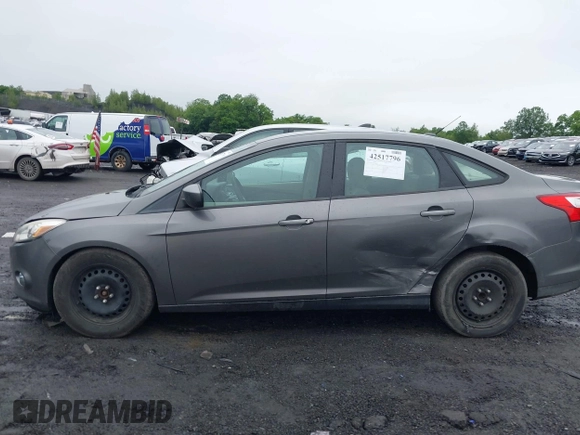 2012 Ford Focus SE z VIN 1FAHP3F29CL442731, wystawiony jako IAAI lot #42517796 z przebiegiem 148 728 mil mil oraz . Historia ofert i sprzedaży dostępna na DreamBid. Obrazek 14.