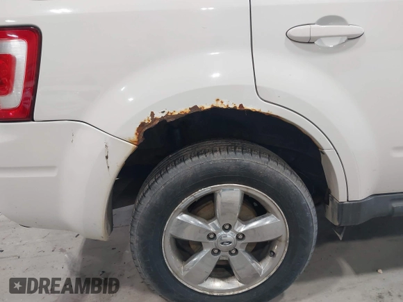 2011 Ford Escape Limited with VIN 1FMCU9EG8BKA65838, listed as a IAAI auction lot 42169155 with 112,122 mi miles. Bid and sale history available at carsss.com. Image 6.
