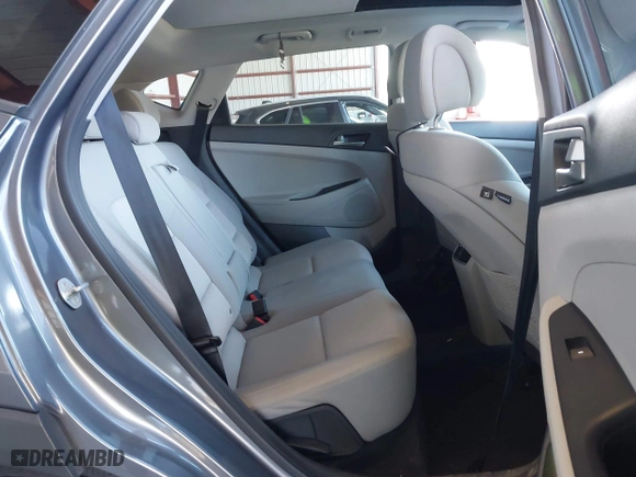 2018 Hyundai Tucson Value with VIN KM8J3CA20JU762120, listed as a IAAI auction lot 41878796 with 103,346 mi miles. Bid and sale history available at carsss.com. Image 8.