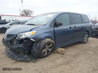 2015 Toyota Sienna L with VIN 5TDZK3DC6FS542457, listed as a IAAI auction lot 41072508 with 167,509 mi miles. Bid and sale history available at carsss.com. Image 2.