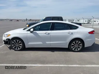 2020 Ford Fusion SE with VIN 3FA6P0T92LR249765, listed as a IAAI auction lot 41789244 with 50,027 mi miles and . Bid and sale history available at DreamBid. Image 14.