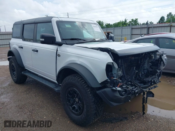 2023 Ford Bronco z VIN 1FMEE5DP2PLB16493, wystawiony jako IAAI lot #42507079 z przebiegiem 59 656 mil mil oraz . Historia ofert i sprzedaży dostępna na DreamBid. Obrazek 1.