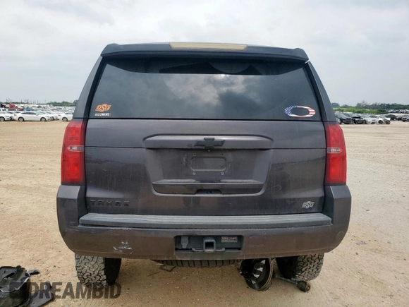 2015 Chevrolet Tahoe LT with VIN 1GNSKBKC1FR139281, listed as a Copart auction lot 57583595 with 142,090 mi miles and Salvage title. Bid and sale history available at DreamBid. Image 6.