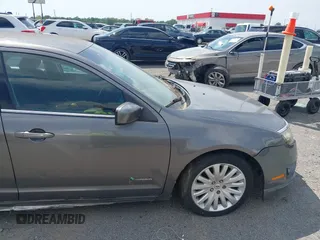 2010 Ford Fusion Hybrid with VIN 3FADP0L37AR270739, listed as a IAAI auction lot 42143035 with 238,111 mi miles. Bid and sale history available at carsss.com. Image 14.