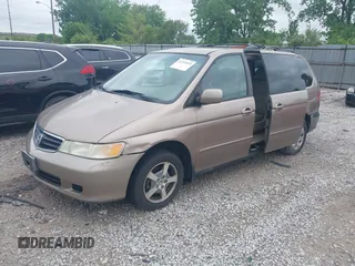 2003 Honda Odyssey EX-L z VIN 5FNRL18973B122173, wystawiony jako IAAI lot #42252018 z przebiegiem 204 487 mil mil oraz . Historia ofert i sprzedaży dostępna na DreamBid. Obrazek 2.
