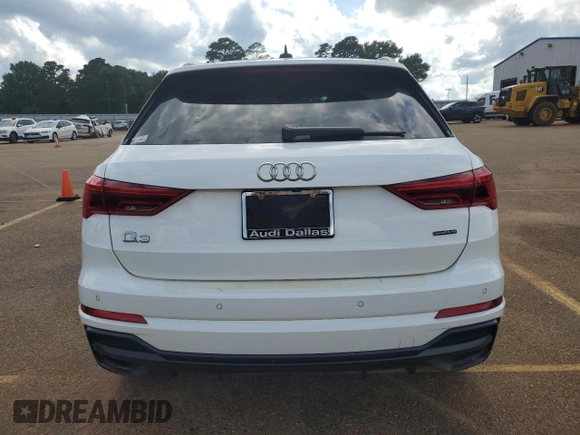 2020 Audi Q3 S line Premium with VIN WA1DECF32L1104309, listed as a Copart auction lot 57162424 with 68,523 mi miles and Salvage title. Bid and sale history available at DreamBid. Image 6.