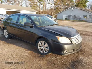 2010 Toyota Avalon XL with VIN 4T1BK3DB0AU355952, listed as a IAAI auction lot 41834083 with 177,098 mi miles and . Bid and sale history available at carsss.com. Image 1.