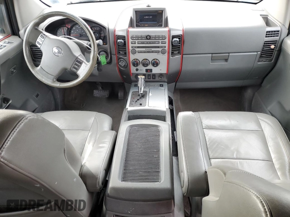 2007 Nissan Titan LE with VIN 1N6AA07B77N219993, listed as a Copart auction lot 44948415 with 170,422 mi miles and Salvage title. Bid and sale history available at DreamBid. Image 8.