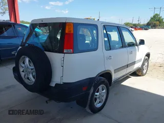 1999 Honda CR-V EX with VIN JHLRD1860XC037846, listed as a IAAI auction lot 42037921 with 164,477 mi miles. Bid and sale history available at carsss.com. Image 4.