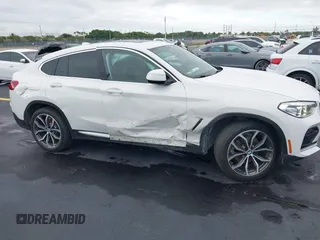 2020 BMW X4 xDrive30i z VIN 5UX2V1C02LLE68148, wystawiony jako IAAI lot #42253362 z przebiegiem 80 865 mil mil oraz . Historia ofert i sprzedaży dostępna na DreamBid. Obrazek 13.