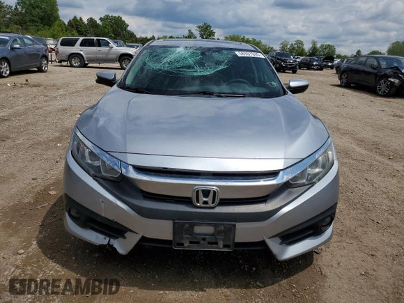 2016 Honda Civic EX-L z VIN 19XFC1F77GE038287, wystawiony jako Copart lot #58937695 z przebiegiem 146 025 mil mil oraz Szkoda całkowita • Salvage title. Historia ofert i sprzedaży dostępna na DreamBid. Obrazek 5.