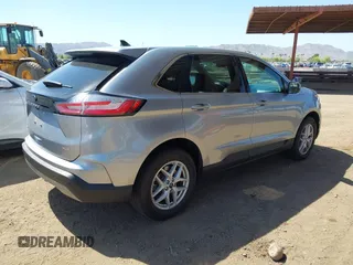 2021 Ford Edge SEL z VIN 2FMPK4J98MBA50772, wystawiony jako IAAI lot #42224052 z przebiegiem 76 061 mil mil oraz . Historia ofert i sprzedaży dostępna na DreamBid. Obrazek 4.