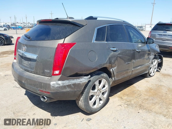 2015 Cadillac SRX Premium Collection with VIN 3GYFNDE32FS569269, listed as a IAAI auction lot 41988807 with 56,481 mi miles. Bid and sale history available at carsss.com. Image 4.