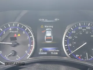 2014 Infiniti Q50 Premium z VIN JN1BV7AR4EM695232, wystawiony jako IAAI lot #42367581 z przebiegiem 138 063 mil mil oraz . Historia ofert i sprzedaży dostępna na DreamBid. Obrazek 7.