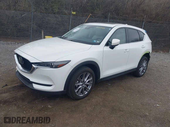 2020 Mazda CX-5 Grand Touring with VIN JM3KFBDM5L0731373, listed as a IAAI auction lot 41900567 with 31,268 mi miles and . Bid and sale history available at DreamBid. Image 17.