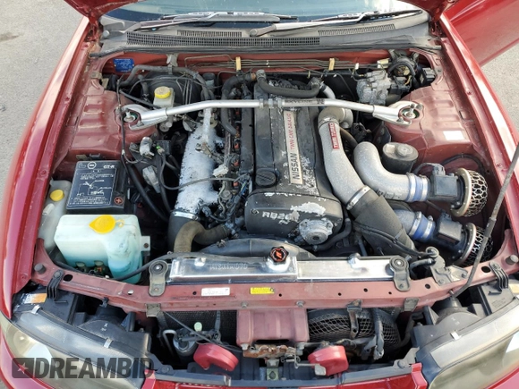 1997 Nissan Skyline z VIN BCNR33042682, wystawiony jako Copart lot #76562674 z przebiegiem 61 791 mil mil oraz Czysty tytuł • Clean title. Historia ofert i sprzedaży dostępna na DreamBid. Obrazek 13.