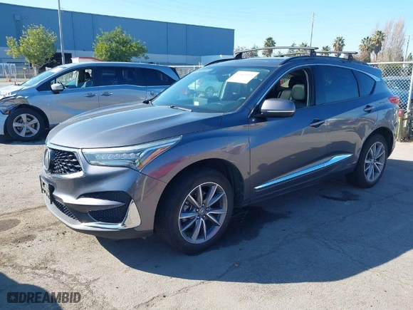 2019 Acura RDX w/Technology Pkg with VIN 5J8TC2H51KL000186, listed as a IAAI auction lot 41403335 with 140,920 mi miles. Bid and sale history available at carsss.com. Image 2.
