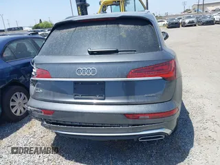 2022 Audi Q5 S line Premium z VIN WA1GAAFY3N2088773, wystawiony jako IAAI lot #41969990 z przebiegiem 22 922 mil mil oraz . Historia ofert i sprzedaży dostępna na DreamBid. Obrazek 17.