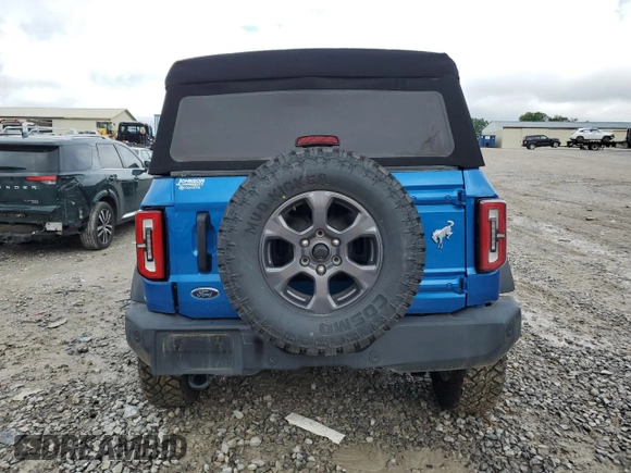 2021 Ford Bronco with VIN 1FMDE5BH9MLB02593, listed as a Copart auction lot 59632675 with 64,833 mi miles and Salvage title. Bid and sale history available at DreamBid. Image 6.
