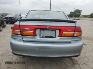 2002 Saturn LS z VIN 1G8JW54R62Y575372, wystawiony jako Copart lot #66519204 z przebiegiem 143 144 mil mil oraz Tytuł czysty. Historia ofert i sprzedaży dostępna na DreamBid. Obrazek 6.