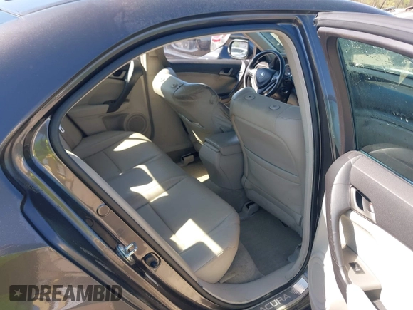 2010 Acura TSX with VIN JH4CU2F63AC003630, listed as a IAAI auction lot 42002216 with 131,244 mi miles. Bid and sale history available at carsss.com. Image 8.