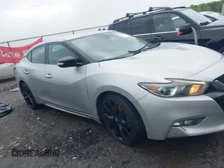 2017 Nissan Maxima SR with VIN 1N4AA6AP2HC396545, listed as a IAAI auction lot 41910588 with 142,661 mi miles and . Bid and sale history available at DreamBid. Image 13.