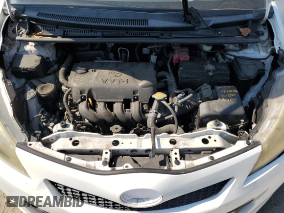 2012 Toyota Yaris L with VIN JTDKTUD30CD527531, listed as a Copart auction lot 65022015 with 157,177 mi miles and Salvage title. Bid and sale history available at DreamBid. Image 11.