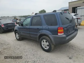 2001 Ford Escape XLT with VIN 1FMYU03131KF10968, listed as a Copart auction lot 67849474 with 197,328 mi miles and Salvage Title. Bid and sale history available at carsss.com. Image 2.