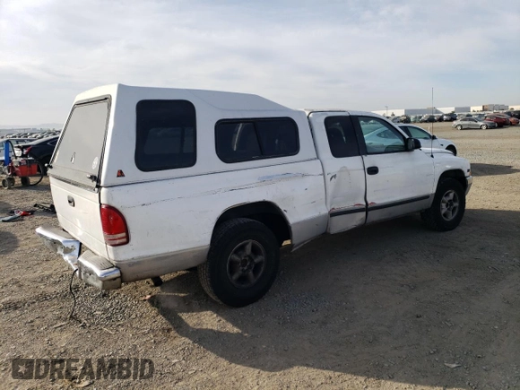 1997 Dodge Dakota z VIN 1B7GL23X0VS124517, wystawiony jako Copart lot #82896894 z przebiegiem 227 782 mil mil oraz Szkoda całkowita • Salvage title. Historia ofert i sprzedaży dostępna na DreamBid. Obrazek 3.