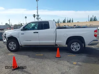 2017 Toyota Tundra SR z VIN 5TFUY5F12HX677173, wystawiony jako IAAI lot #41593761 z przebiegiem 186 206 mil mil oraz . Historia ofert i sprzedaży dostępna na DreamBid. Obrazek 14.