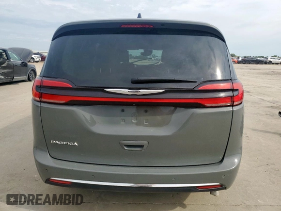 2023 Chrysler Pacifica Hybrid Touring L with VIN 2C4RC1L72PR614075, listed as a Copart auction lot 58586115 with 43,960 mi miles and Salvage title. Bid and sale history available at DreamBid. Image 6.