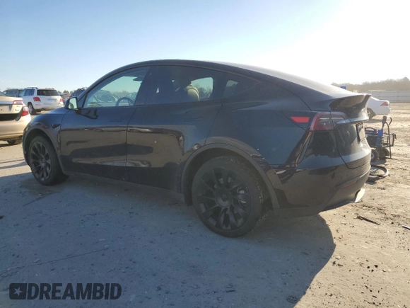 2023 Tesla Model Y Long Range with VIN 7SAYGDEEXPA078937, listed as a Copart auction lot 47095285 with 28,521 mi miles and Salvage Title. Bid and sale history available at DreamBid. Image 2.